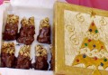 Caja de regalo para las fiestas: Bombones encantados de chocolate y frutos secos (ruso)
